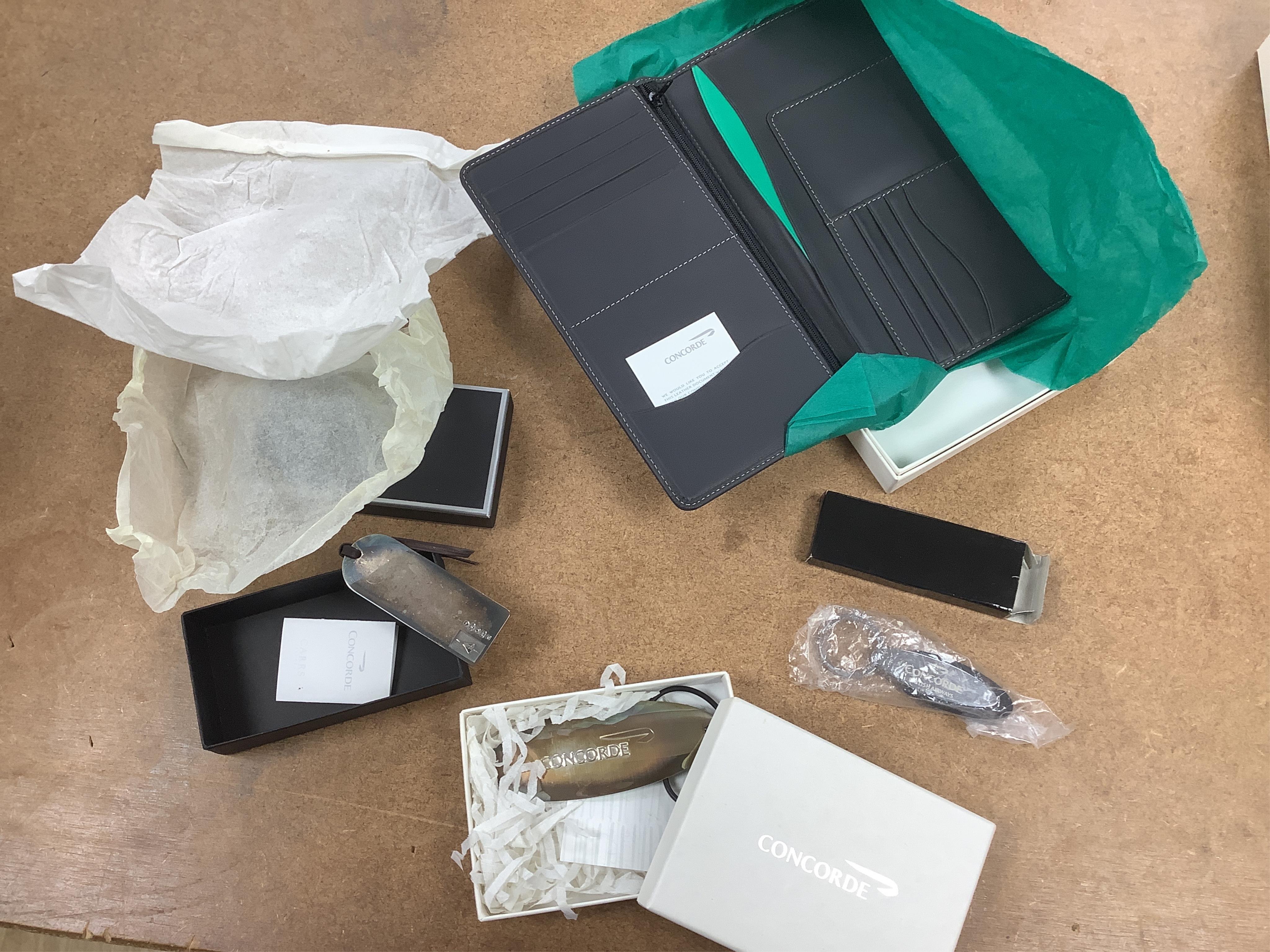 Concorde memorabilia: including silver baggage tags, key rings, Wedgwood photo frames, diaries, wallet, magazines and newspapers etc. condition - fair to good, some items unused